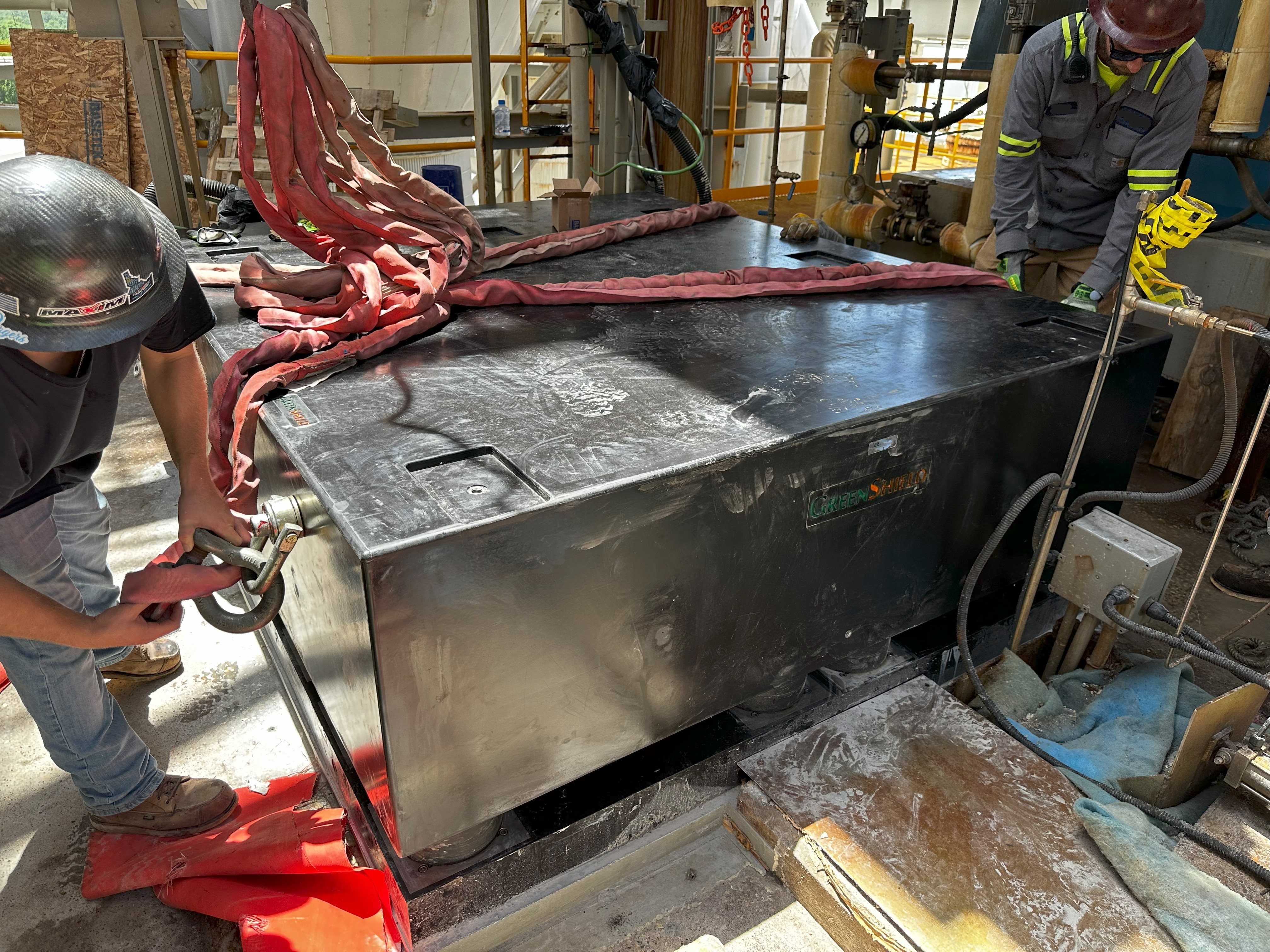 Polymer block foundation installation — precision leveling and alignment of monolithic polymer base for industrial centrifuge
