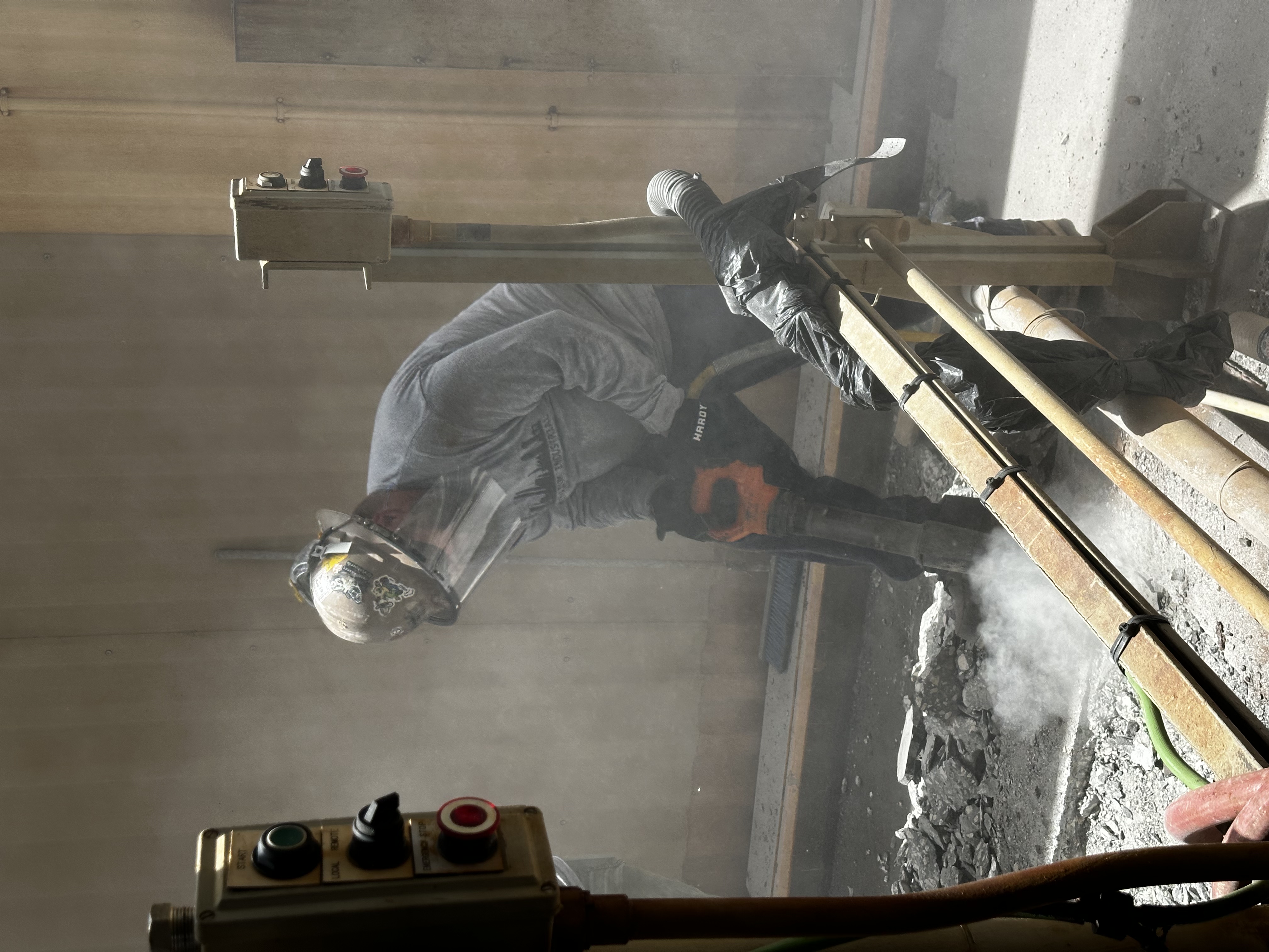 Centrifuge foundation demolition in progress — substrate removal and deck preparation
